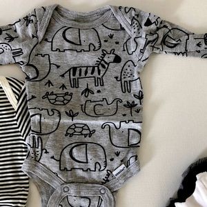 Brand new. Washed 3 piece Gerber long sleeve onesie